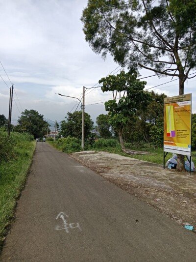 DIJUAL TANAH DATAR SUASANA ASRI SEMI VILLA PAKUHAJI BANDUNG JALAN LEBAR